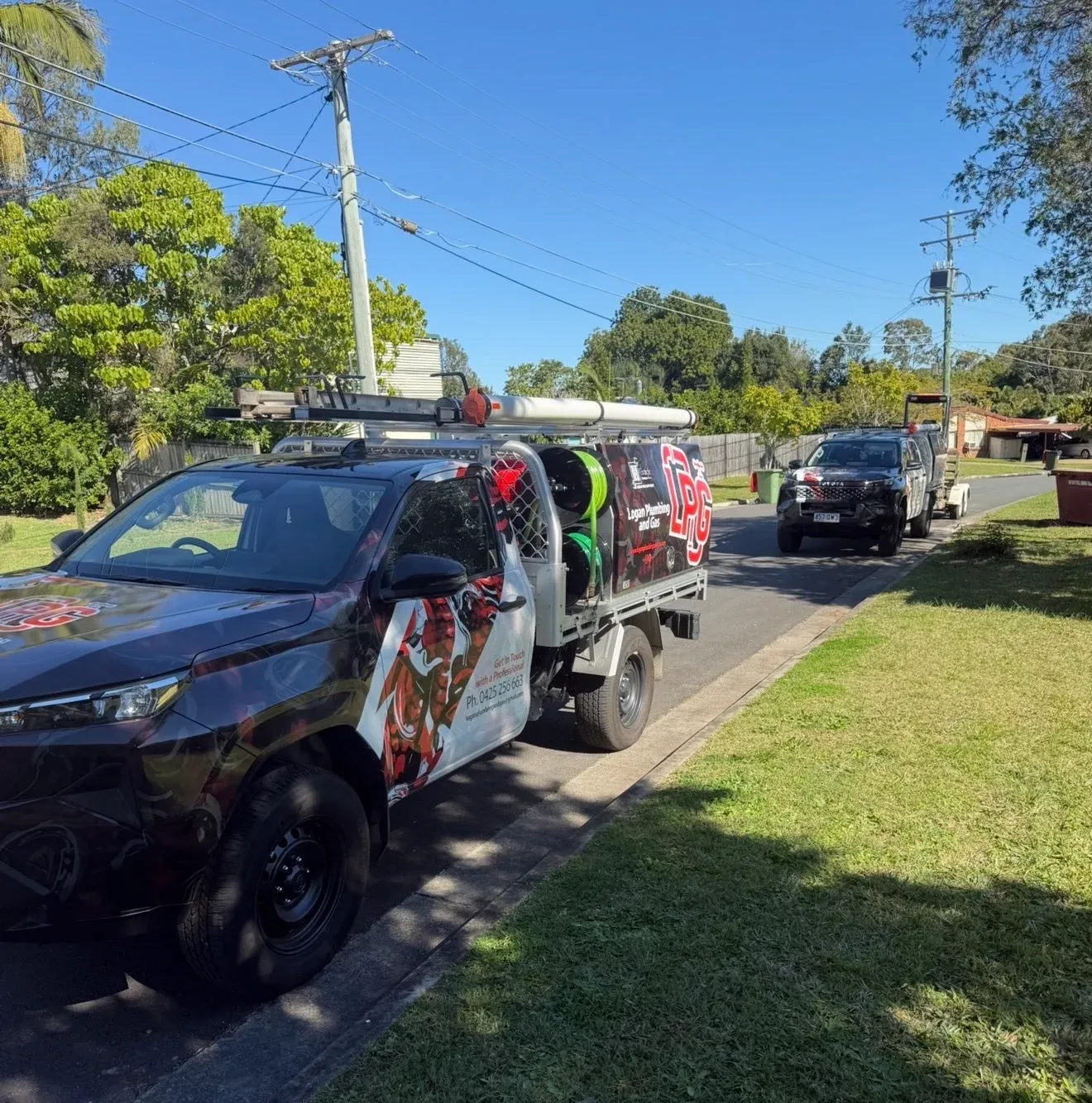 Tradie Marketing Pros utes parked at a job in Logan